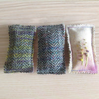 Zipped Pouch in Purple and Green colours.