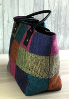 side view of tweed patchwork bag