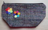 Bolso pequeño con cremallera de tweed en espiga multicolor